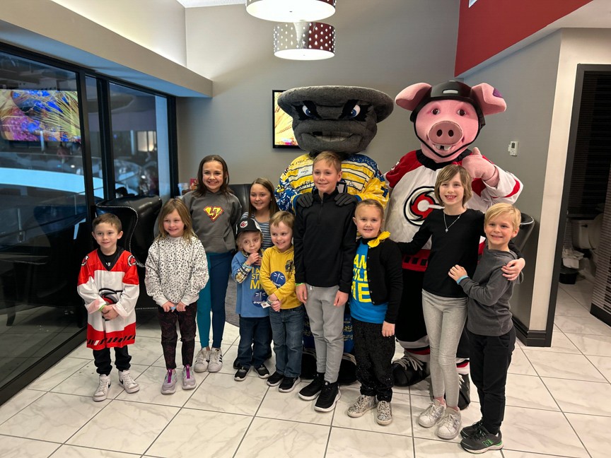 Dragonfly patients celebrate the Cincinnati Cyclones and meet mascots Twister and Puckchop in the Dragonfly Suite. Impact